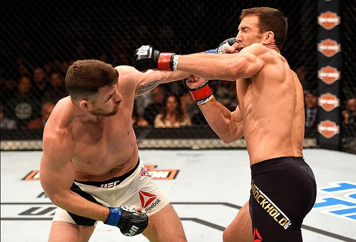 INGLEWOOD, CA - JUNE 04: Michael Bisping throws a left punch against Luke Rockhold in their UFC middleweight championship bout during the UFC 199 event at The Forum on June 4, 2016 in Inglewood, California. (Photo by Josh Hedges/Zuffa LLC/Zuffa LLC via G