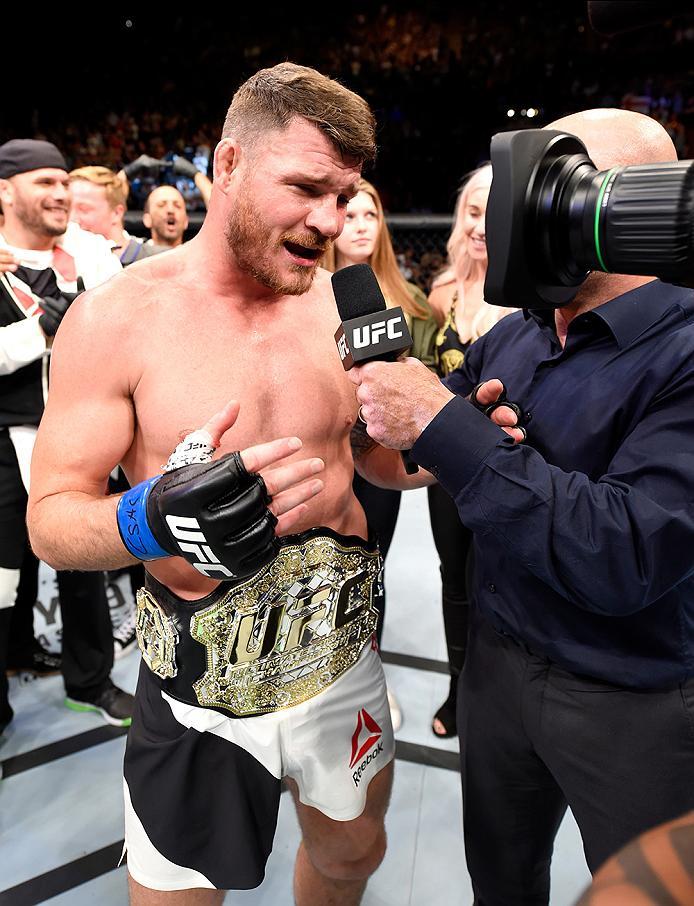 INGLEWOOD, CA - JUNE 04: Michael Bisping of England speaks after his first round knockout win against Luke Rockhold in their UFC middleweight championship bout during the UFC 199 event at The Forum on June 4, 2016 in Inglewood, California. (Photo by Jos
