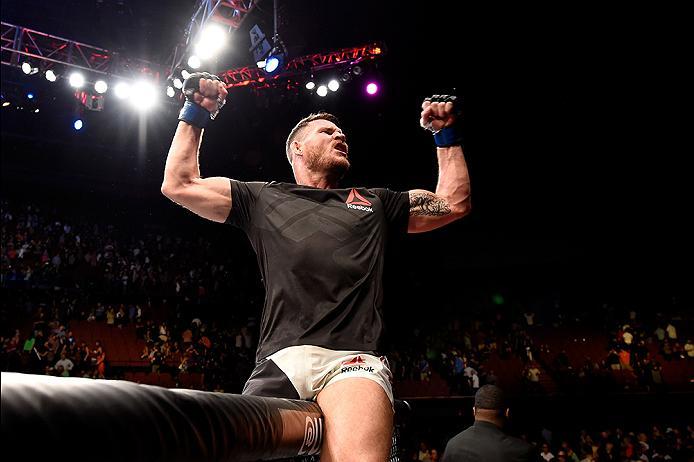 INGLEWOOD, CA - JUNE 04: Michael Bisping of England celebrates after his first round knockout win against Luke Rockhold in their UFC middleweight championship bout during the UFC 199 event at The Forum on June 4, 2016 in Inglewood, California. (Photo by