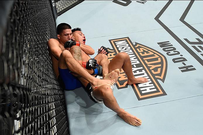 LAS VEGAS, NV - MARCH 04: (L-R) Albert Morales attempts to submit Andre Soukhamthath in their bantamweight bout during the UFC 209 event at T-Mobile Arena on March 4, 2017 in Las Vegas, Nevada. (Photo by Josh Hedges/Zuffa LLC/Zuffa LLC via Getty Images)