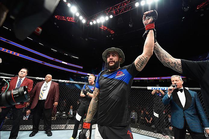 LAS VEGAS, NV - MARCH 04: Tyson Pedro of Australia reacts to his victor over Paul Craig of Scotland in their light heavyweight bout during the UFC 209 event at T-Mobile Arena on March 4, 2017 in Las Vegas, Nevada. (Photo by Josh Hedges/Zuffa LLC/Zuffa LL