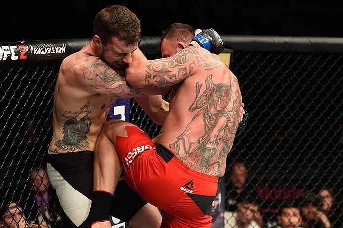 LAS VEGAS, NV - MARCH 04: (R-L) Mark Godbeer of England knees Daniel Spitz in their heavyweight bout during the UFC 209 event at T-Mobile Arena on March 4, 2017 in Las Vegas, Nevada. (Photo by Josh Hedges/Zuffa LLC/Zuffa LLC via Getty Images) *** Local C