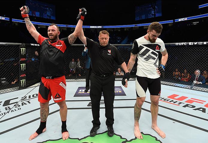 LAS VEGAS, NV - MARCH 04: (L-R) Mark Godbeer of England reacts to his victory over Daniel Spitz in their heavyweight bout during the UFC 209 event at T-Mobile Arena on March 4, 2017 in Las Vegas, Nevada. (Photo by Josh Hedges/Zuffa LLC/Zuffa LLC via Gett