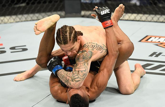 LAS VEGAS, NV - MARCH 04: Luke Sanders (top) elbows Iuri Alcantara of Brazil in their bantamweight bout during the UFC 209 event at T-Mobile Arena on March 4, 2017 in Las Vegas, Nevada. (Photo by Josh Hedges/Zuffa LLC/Zuffa LLC via Getty Images) *** Loc