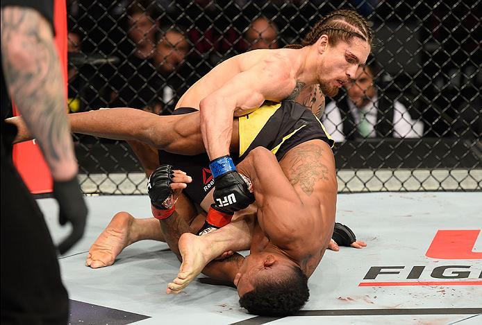 LAS VEGAS, NV - MARCH 04: Iuri Alcantara of Brazil (bottom) grapples with Luke Sanders in their bantamweight bout during the UFC 209 event at T-Mobile Arena on March 4, 2017 in Las Vegas, Nevada. (Photo by Josh Hedges/Zuffa LLC/Zuffa LLC via Getty Images