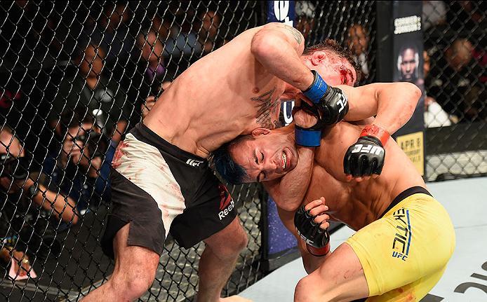 LAS VEGAS, NV - MARCH 04: (L-R) Darren Elkins attempts to submit Mirsad Bektic of Bosnia in their featherweight bout during the UFC 209 event at T-Mobile Arena on March 4, 2017 in Las Vegas, Nevada. (Photo by Josh Hedges/Zuffa LLC/Zuffa LLC via Getty Ima