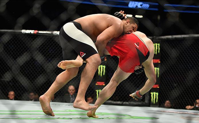 LAS VEGAS, NV - MARCH 04: (L-R) Luis Henrique of Brazil takes down Marcin Tybura of Poland in their heavyweight bout during the UFC 209 event at T-Mobile Arena on March 4, 2017 in Las Vegas, Nevada. (Photo by Jeff Bottari/Zuffa LLC/Zuffa LLC via Getty Im