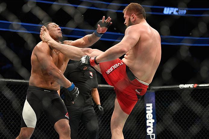 LAS VEGAS, NV - MARCH 04: (R-L) Marcin Tybura of Poland kicks Luis Henrique of Brazil in their heavyweight bout during the UFC 209 event at T-Mobile Arena on March 4, 2017 in Las Vegas, Nevada. (Photo by Jeff Bottari/Zuffa LLC/Zuffa LLC via Getty Images)