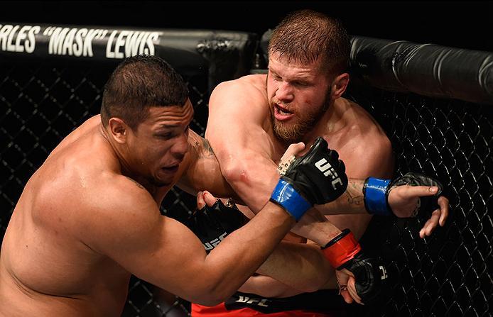 LAS VEGAS, NV - MARCH 04: (R-L) Marcin Tybura of Poland punches Luis Henrique of Brazil in their heavyweight bout during the UFC 209 event at T-Mobile Arena on March 4, 2017 in Las Vegas, Nevada. (Photo by Josh Hedges/Zuffa LLC/Zuffa LLC via Getty Images