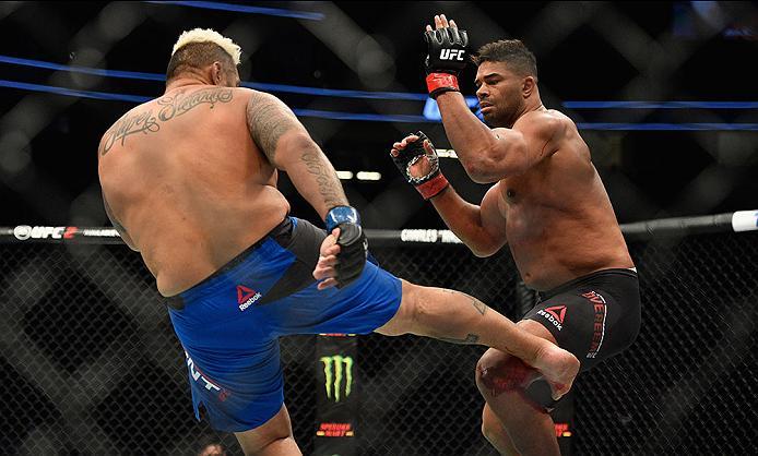 LAS VEGAS, NV - MARCH 04: (L-R) Mark Hunt of New Zealand kicks Alistair Overeem of the Netherlands in their heavyweight bout during the UFC 209 event at T-Mobile Arena on March 4, 2017 in Las Vegas, Nevada. (Photo by Jeff Bottari/Zuffa LLC/Zuffa LLC via