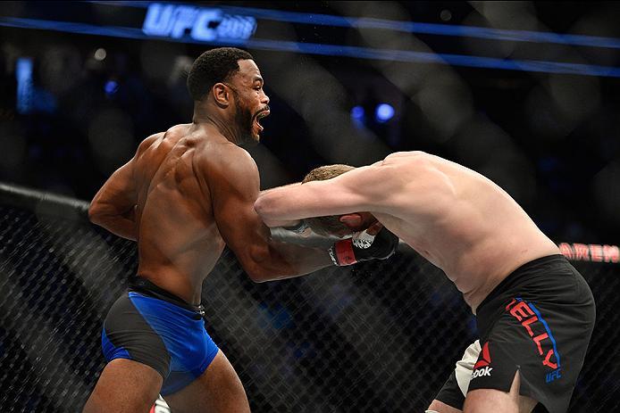 LAS VEGAS, NV - MARCH 04: (L-R) Rashad Evans punches Daniel Kelly of Australia in their middleweight bout during the UFC 209 event at T-Mobile Arena on March 4, 2017 in Las Vegas, Nevada. (Photo by Jeff Bottari/Zuffa LLC/Zuffa LLC via Getty Images) *** L