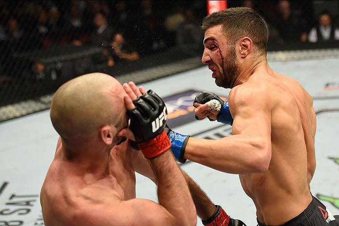 LAS VEGAS, NV - MARCH 04: (R-L) David Teymur of Sweden punches Lando Vannata in their lightweight bout during the UFC 209 event at T-Mobile Arena on March 4, 2017 in Las Vegas, Nevada. (Photo by Josh Hedges/Zuffa LLC/Zuffa LLC via Getty Images) *** Local