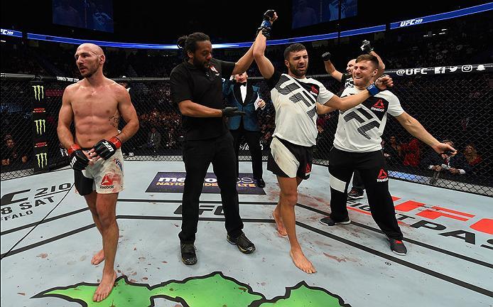 LAS VEGAS, NV - MARCH 04: David Teymur of Sweden (center) reacts to his victory over Lando Vannata (left) in their lightweight bout during the UFC 209 event at T-Mobile Arena on March 4, 2017 in Las Vegas, Nevada. (Photo by Josh Hedges/Zuffa LLC/Zuffa LL