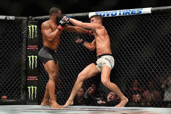 LAS VEGAS, NV - MARCH 04: (L-R) Tyron Woodley punches Stephen Thompson in their UFC welterweight championship bout during the UFC 209 event at T-Mobile Arena on March 4, 2017 in Las Vegas, Nevada. (Photo by Jeff Bottari/Zuffa LLC/Zuffa LLC via Getty Imag