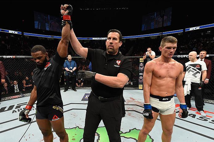 LAS VEGAS, NV - MARCH 04: Tyron Woodley (left) reacts to his victory over Stephen Thompson (right) in their UFC welterweight championship bout during the UFC 209 event at T-Mobile Arena on March 4, 2017 in Las Vegas, Nevada. (Photo by Josh Hedges/Zuffa L