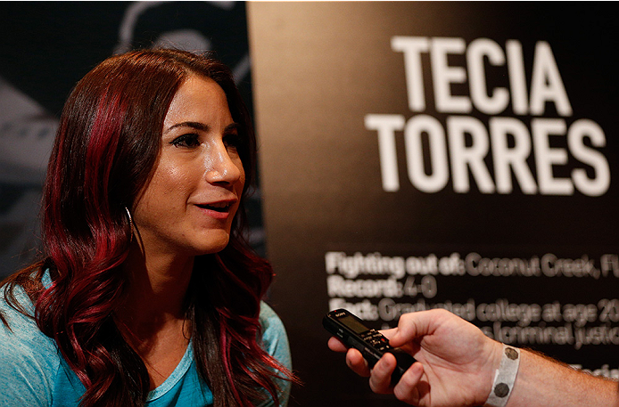 LAS VEGAS, NV - JULY 03: The Ultimate Fighter season 20 cast member Tecia Torres interacts with media during the UFC Ultimate Media Day at the Mandalay Bay Resort and Casino on July 3, 2014 in Las Vegas, Nevada. (Photo by Josh Hedges/Zuffa LLC/Zuffa LLC