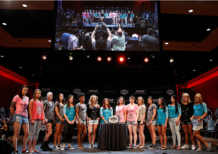 LAS VEGAS, NV - JULY 03: A general view of the entire cast of The Ultimate Fighter season 20 is seen on stage with the UFC strawweight title belt during the UFC Ultimate Media Day at the Mandalay Bay Resort and Casino on July 3, 2014 in Las Vegas, Nevada