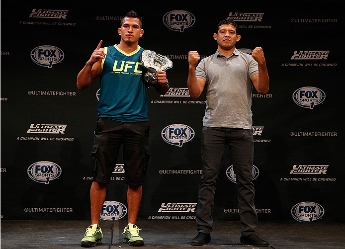 LAS VEGAS, NV - JULY 03: (L-R) UFC lightweight champion Anthony Pettis and upcoming opponent Gilbert Melendez pose for photos during the UFC Ultimate Media Day at the Mandalay Bay Resort and Casino on July 3, 2014 in Las Vegas, Nevada. (Photo by Josh He