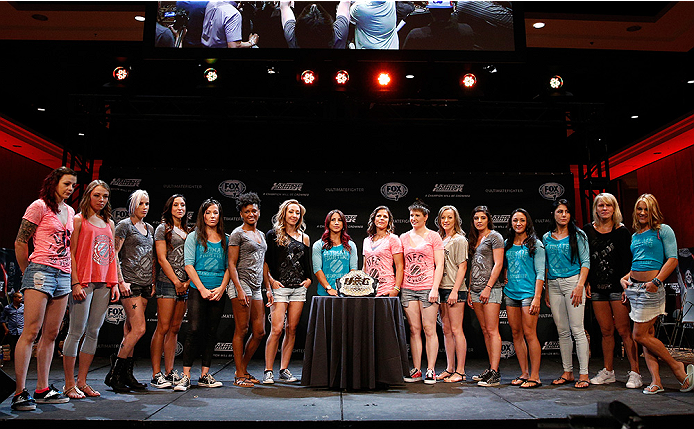 LAS VEGAS, NV - JULY 03: A general view of the entire cast of The Ultimate Fighter season 20 is seen on stage with the UFC strawweight title belt during the UFC Ultimate Media Day at the Mandalay Bay Resort and Casino on July 3, 2014 in Las Vegas, Nevada