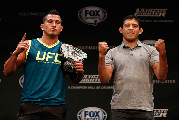 LAS VEGAS, NV - JULY 03: (L-R) UFC lightweight champion Anthony Pettis and upcoming opponent Gilbert Melendez pose for photos during the UFC Ultimate Media Day at the Mandalay Bay Resort and Casino on July 3, 2014 in Las Vegas, Nevada. (Photo by Josh He