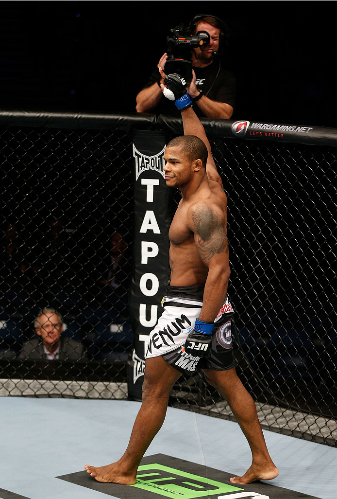 BRISBANE, AUSTRALIA - DECEMBER 07: Alex Garcia reacts after his knockout victory over Ben Wall in their welterweight fight during the UFC Fight Night event at the Brisbane Entertainment Centre on December 7, 2013 in Brisbane, Australia. (Photo by Josh He
