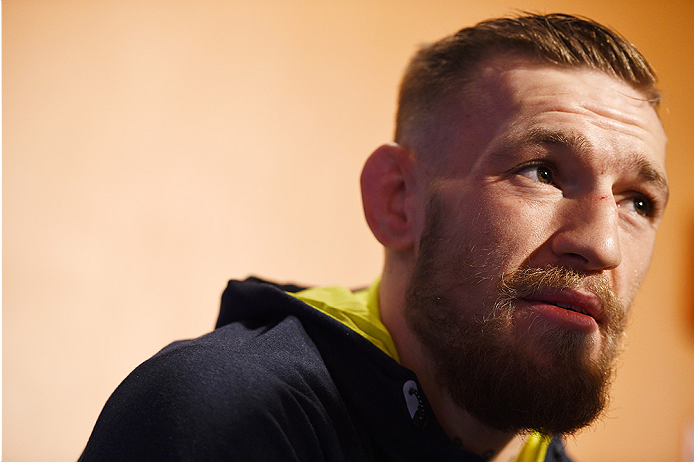 BOSTON, MA - JANUARY 16: UFC featherweight Conor McGregor of Ireland interacts with media at Faneuil Hall on January 16, 2015 in Boston, Massachusetts. (Photo by Jeff Bottari/Zuffa LLC/Zuffa LLC via Getty Images)