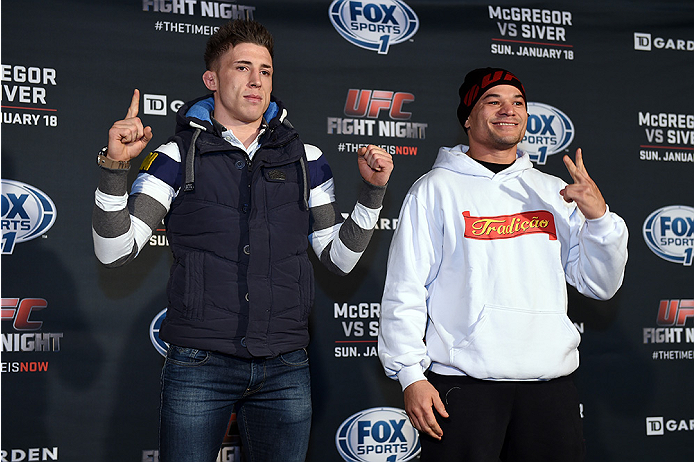 BOSTON, MA - JANUARY 16: (L-R) UFC lightweights Norman Parke of Ireland faces off with opponent Gleison Tibau of Brazil at Faneuil Hall on January 16, 2015 in Boston, Massachusetts. (Photo by Jeff Bottari/Zuffa LLC/Zuffa LLC via Getty Images)