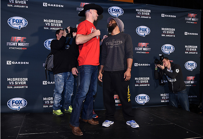 BOSTON, MA - JANUARY 16: (L-R) UFC lightweights Donald 'Cowboy' Cerrone and Benson 'Smooth' Henderson face off for the media at Faneuil Hall on January 16, 2015 in Boston, Massachusetts. (Photo by Jeff Bottari/Zuffa LLC/Zuffa LLC via Getty Images)