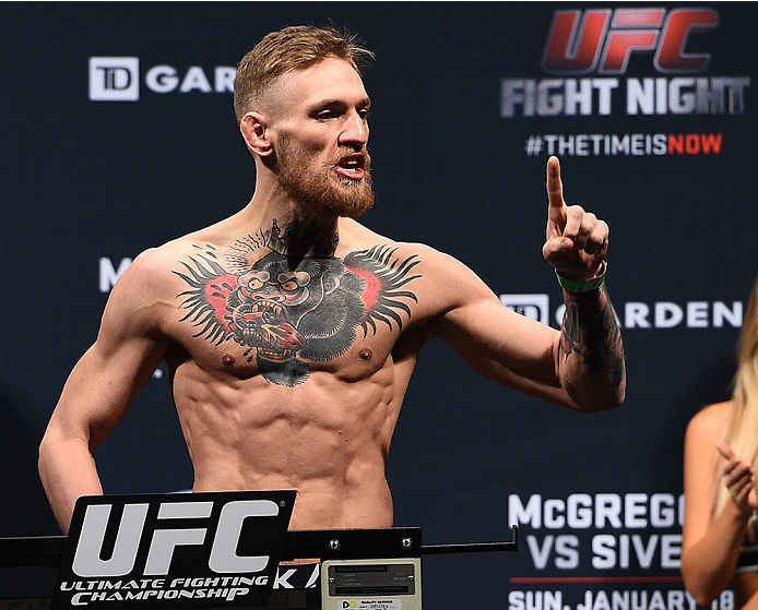 BOSTON, MA - JANUARY 17: Conor 'The Notorious' McGregor of Ireland steps on the scale during the UFC Fight Night Boston weigh-in event at the Orpheum Theatre on January 17, 2015 in Boston, Massachusetts. (Photo by Jeff Bottari/Zuffa LLC/Zuffa LLC via Get