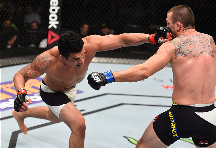 BOSTON, MA - JANUARY 17: (L-R) Francimar Barroso of Brazil punches Elvis Mutapcic of Bosnia in their light heavyweight bout during the UFC Fight Night event inside TD Garden on January 17, 2016 in Boston, Massachusetts. (Photo by Jeff Bottari/Zuffa LLC/Z