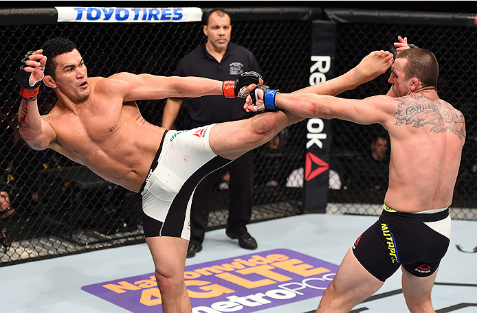 BOSTON, MA - JANUARY 17: (L-R) Francimar Barroso of Brazil kicks Elvis Mutapcic of Bosnia in their light heavyweight bout during the UFC Fight Night event inside TD Garden on January 17, 2016 in Boston, Massachusetts. (Photo by Jeff Bottari/Zuffa LLC/Zuf