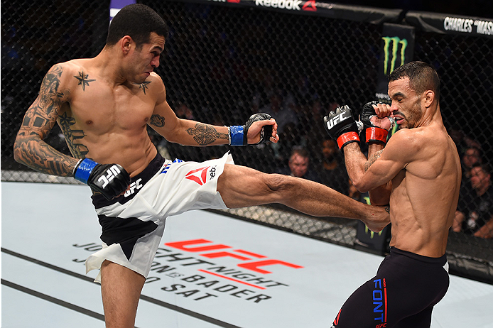 BOSTON, MA - JANUARY 17: (L-R) Joey Gomez kicks Rob Font in their bantamweight bout during the UFC Fight Night event inside TD Garden on January 17, 2016 in Boston, Massachusetts. (Photo by Jeff Bottari/Zuffa LLC/Zuffa LLC via Getty Images)