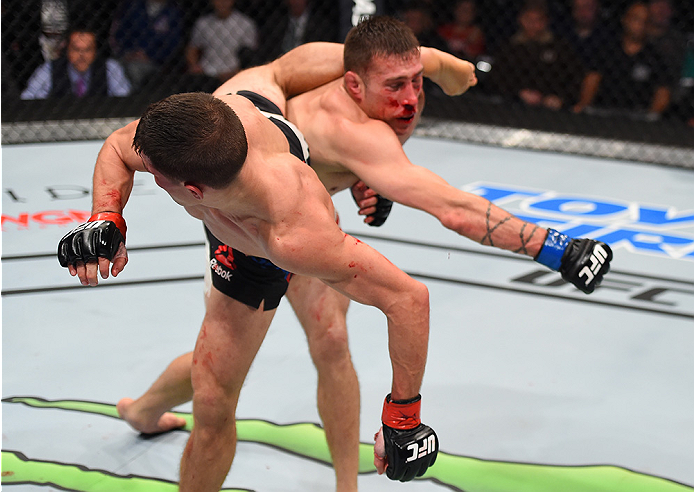 BOSTON, MA - JANUARY 17: (L-R) Charles Rosa kicks Kyle Bochniak in their featherweight bout during the UFC Fight Night event inside TD Garden on January 17, 2016 in Boston, Massachusetts. (Photo by Jeff Bottari/Zuffa LLC/Zuffa LLC via Getty Images)