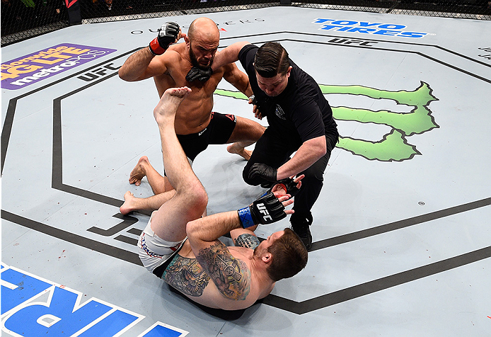 BOSTON, MA - JANUARY 17: The referee moves in to stop the fight as Ilir Latifi (L) of Sweden defeats Sean OConnell (R) in their light heavyweight bout during the UFC Fight Night event inside TD Garden on January 17, 2016 in Boston, Massachusetts. (Photo