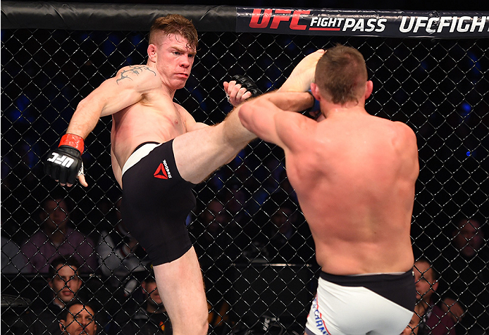 BOSTON, MA - JANUARY 17: (L-R) Paul Felder kicks Daron Cruickshank in their lightweight bout during the UFC Fight Night event inside TD Garden on January 17, 2016 in Boston, Massachusetts. (Photo by Jeff Bottari/Zuffa LLC/Zuffa LLC via Getty Images)