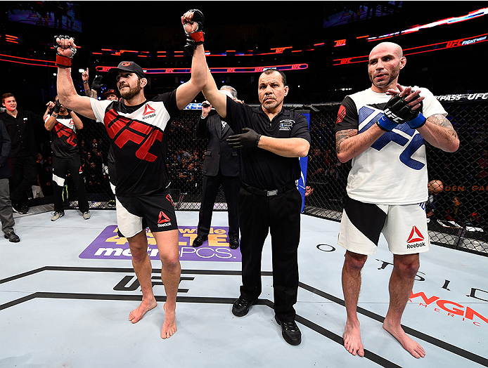 BOSTON, MA - JANUARY 17: Patrick Cote (L) of Canada celebrates after his TKO victory over Ben Saunders in their welterweight bout during the UFC Fight Night event inside TD Garden on January 17, 2016 in Boston, Massachusetts. (Photo by Jeff Bottari/Zuffa