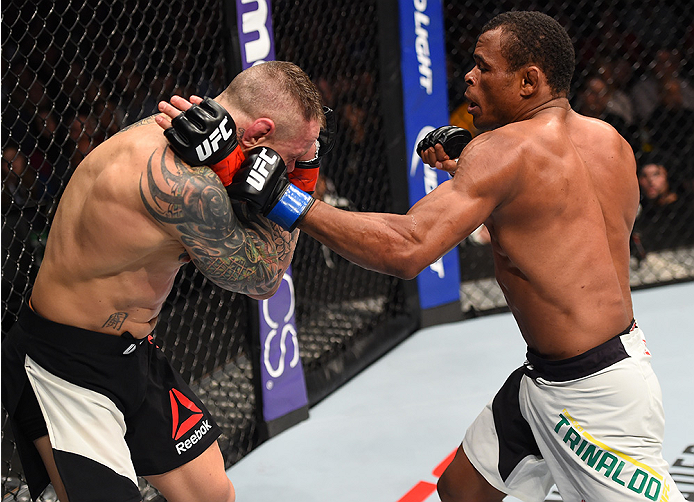 BOSTON, MA - JANUARY 17: (R-L) Francisco Trinaldo of Brazil punches Ross Pearson of England in their lightweight bout during the UFC Fight Night event inside TD Garden on January 17, 2016 in Boston, Massachusetts. (Photo by Jeff Bottari/Zuffa LLC/Zuffa L