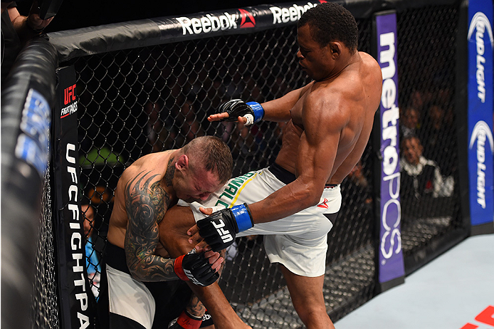 BOSTON, MA - JANUARY 17: (R-L) Francisco Trinaldo of Brazil knees Ross Pearson of England in their lightweight bout during the UFC Fight Night event inside TD Garden on January 17, 2016 in Boston, Massachusetts. (Photo by Jeff Bottari/Zuffa LLC/Zuffa LLC