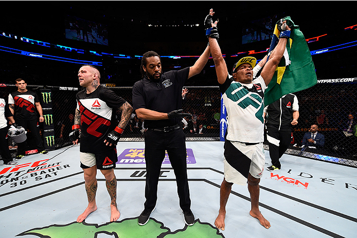 BOSTON, MA - JANUARY 17: Francisco Trinaldo (R) of Brazil celebrates after his victory over Ross Pearson of England in their lightweight bout during the UFC Fight Night event inside TD Garden on January 17, 2016 in Boston, Massachusetts. (Photo by Jeff B