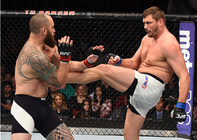 BOSTON, MA - JANUARY 17: (R-L) Matt Mitrione kicks Travis Browne in their heavyweight bout during the UFC Fight Night event inside TD Garden on January 17, 2016 in Boston, Massachusetts. (Photo by Jeff Bottari/Zuffa LLC/Zuffa LLC via Getty Images)