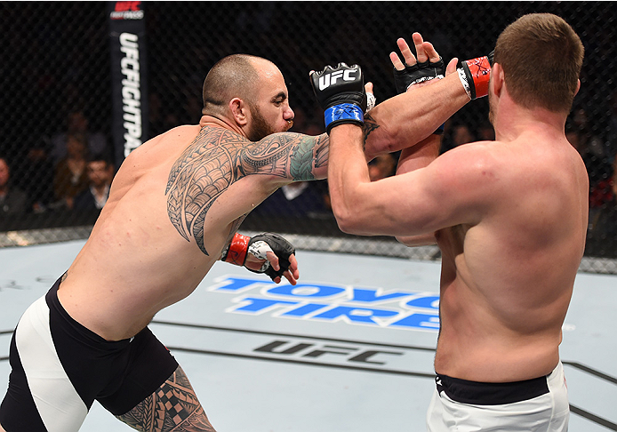 BOSTON, MA - JANUARY 17: (L-R) Travis Browne punches Matt Mitrione in their heavyweight bout during the UFC Fight Night event inside TD Garden on January 17, 2016 in Boston, Massachusetts. (Photo by Jeff Bottari/Zuffa LLC/Zuffa LLC via Getty Images)