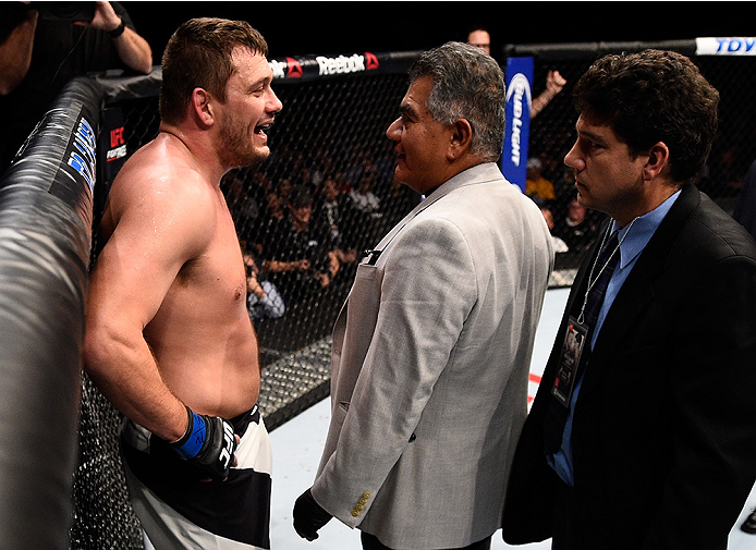 BOSTON, MA - JANUARY 17: Matt Mitrione is examined by doctors after receiving two accidental eye pokes from opponent Travis Browne in their heavyweight bout during the UFC Fight Night event inside TD Garden on January 17, 2016 in Boston, Massachusetts. (