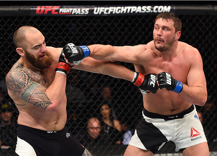 BOSTON, MA - JANUARY 17: (R-L) Matt Mitrione punches Travis Browne in their heavyweight bout during the UFC Fight Night event inside TD Garden on January 17, 2016 in Boston, Massachusetts. (Photo by Jeff Bottari/Zuffa LLC/Zuffa LLC via Getty Images)