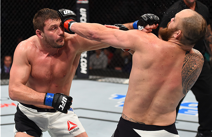 BOSTON, MA - JANUARY 17: (L-R) Matt Mitrione punches Travis Browne in their heavyweight bout during the UFC Fight Night event inside TD Garden on January 17, 2016 in Boston, Massachusetts. (Photo by Jeff Bottari/Zuffa LLC/Zuffa LLC via Getty Images)