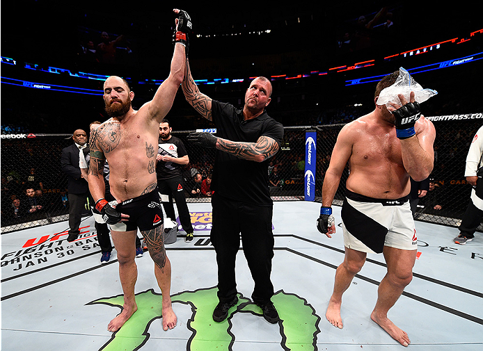 BOSTON, MA - JANUARY 17: Travis Browne (L) celebrates after his TKO victory over Matt Mitrione in their heavyweight bout during the UFC Fight Night event inside TD Garden on January 17, 2016 in Boston, Massachusetts. (Photo by Jeff Bottari/Zuffa LLC/Zuff