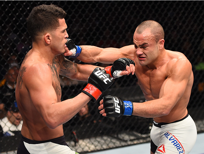 BOSTON, MA - JANUARY 17: (R-L) Eddie Alvarez punches Anthony Pettis in their lightweight bout during the UFC Fight Night event inside TD Garden on January 17, 2016 in Boston, Massachusetts. (Photo by Jeff Bottari/Zuffa LLC/Zuffa LLC via Getty Images)