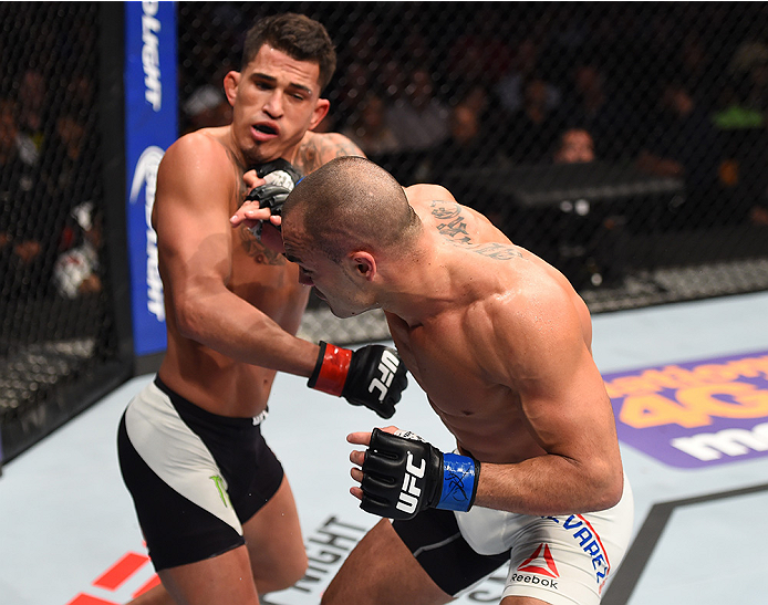 BOSTON, MA - JANUARY 17: (R-L) Eddie Alvarez punches Anthony Pettis in their lightweight bout during the UFC Fight Night event inside TD Garden on January 17, 2016 in Boston, Massachusetts. (Photo by Jeff Bottari/Zuffa LLC/Zuffa LLC via Getty Images)