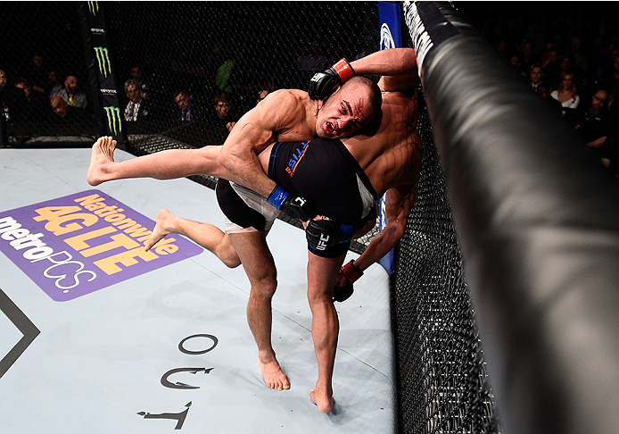 BOSTON, MA - JANUARY 17: (L-R) Eddie Alvarez takes down Anthony Pettis in their lightweight bout during the UFC Fight Night event inside TD Garden on January 17, 2016 in Boston, Massachusetts. (Photo by Jeff Bottari/Zuffa LLC/Zuffa LLC via Getty Images)