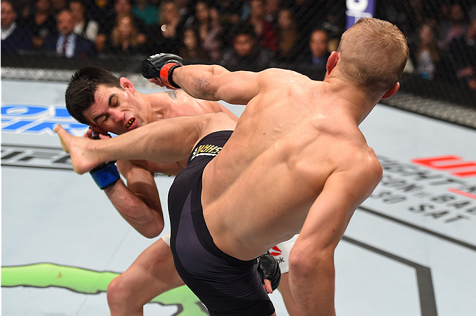 BOSTON, MA - JANUARY 17: (R-L) TJ Dillashaw kicks Dominick Cruz in their UFC bantamweight championship bout during the UFC Fight Night event inside TD Garden on January 17, 2016 in Boston, Massachusetts. (Photo by Jeff Bottari/Zuffa LLC/Zuffa LLC via Get