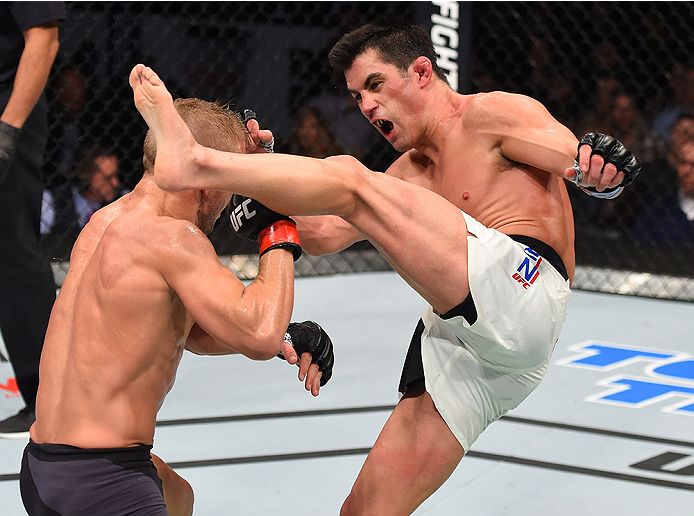 BOSTON, MA - JANUARY 17: (R-L) Dominick Cruz kicks TJ Dillashaw in their UFC bantamweight championship bout during the UFC Fight Night event inside TD Garden on January 17, 2016 in Boston, Massachusetts. (Photo by Jeff Bottari/Zuffa LLC/Zuffa LLC via Get